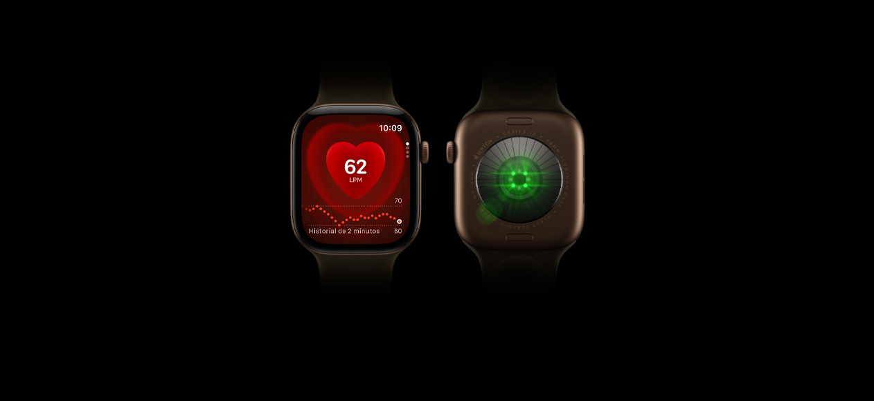 Dos dispositivos Apple Watch Series 12, caja de aluminio, color bronce oscuro, correa deportiva color oliva, uno muestra la parte frontal del reloj con la app Frecuencia Cardiaca, el otro muestra la parte trasera del reloj con el sistema de registro de datos de salud con luces LED verdes