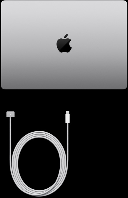 MacBook Pro, värinä hopea, ylhäältä kuvattuna, suljettuna, latausjohdon ja virtalähteen vieressä